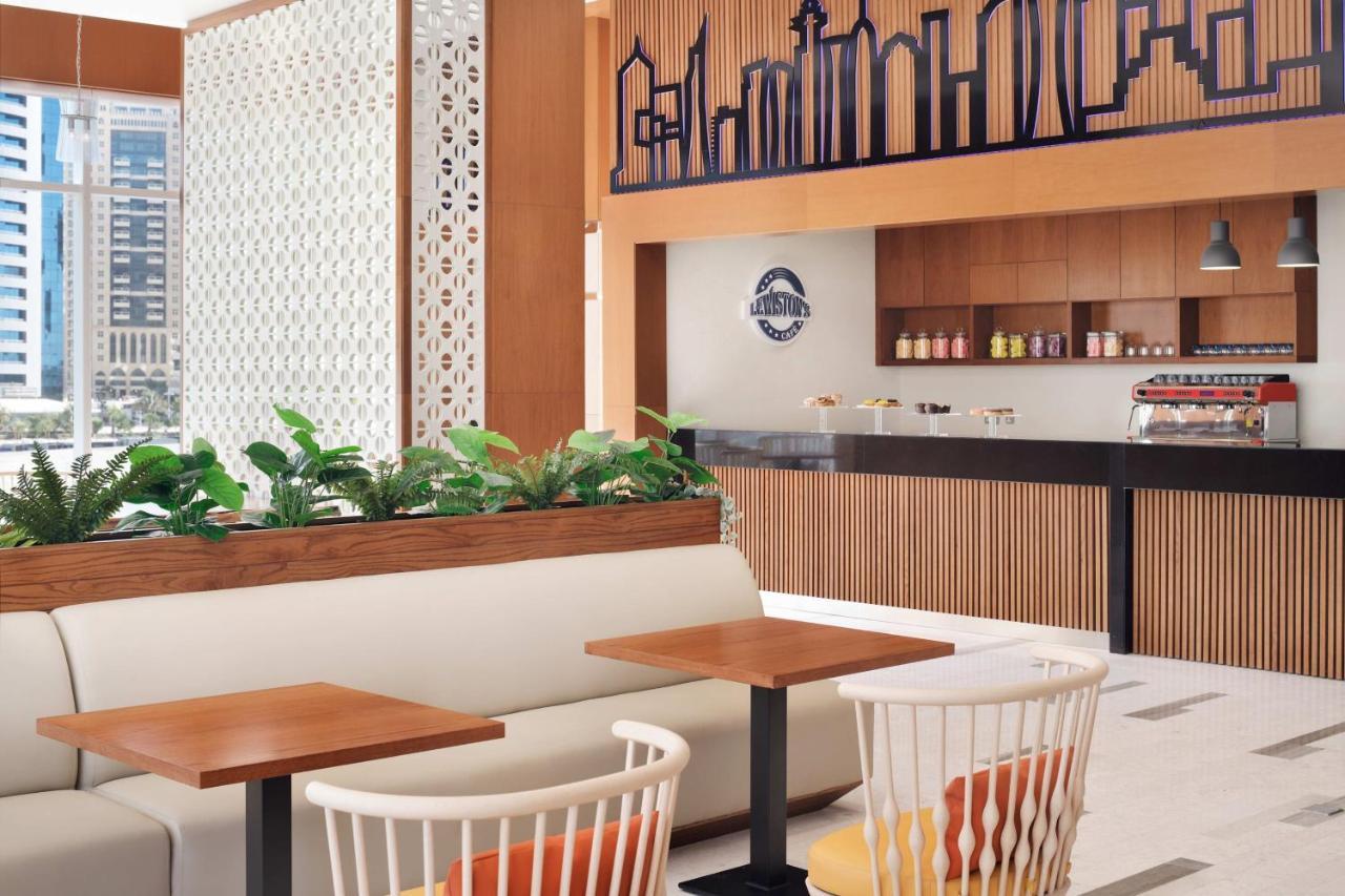 Delta Hotels By Marriott City Center Doha Luaran gambar The interior of a typical Starbucks